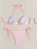 Backless white lace and pink bikini