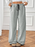 Belted casual straight-leg pants with contrasting trim and elastic waist